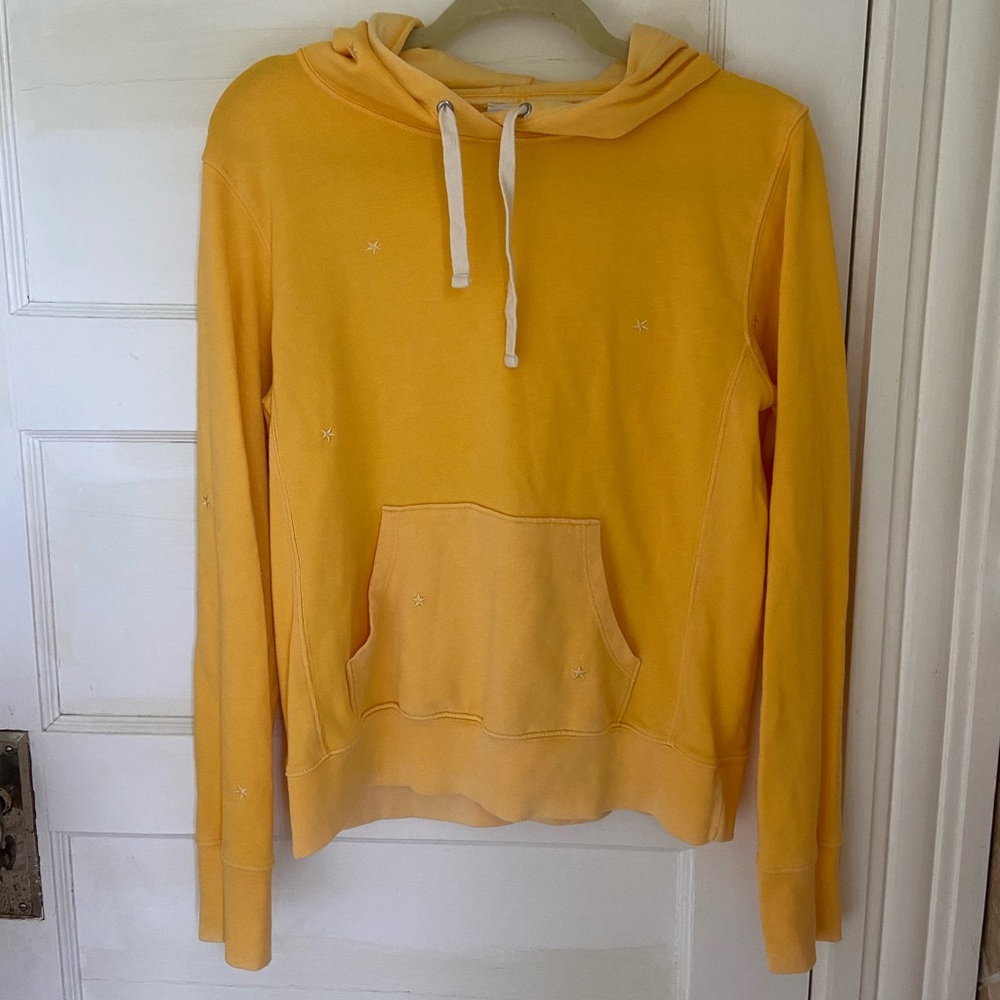 Yellow hoodie with embroidered stars